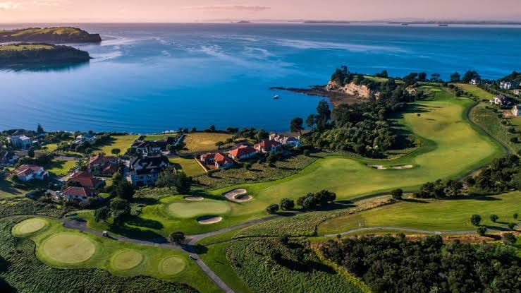 View from the air of the Gulf Harbour Country Club golf course and Hauraki Gulf